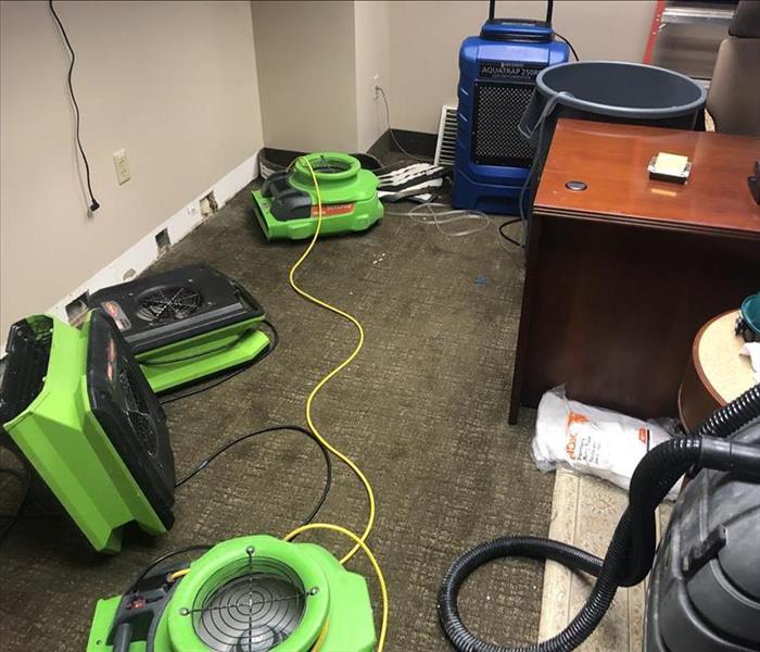 Floor dryers in office building